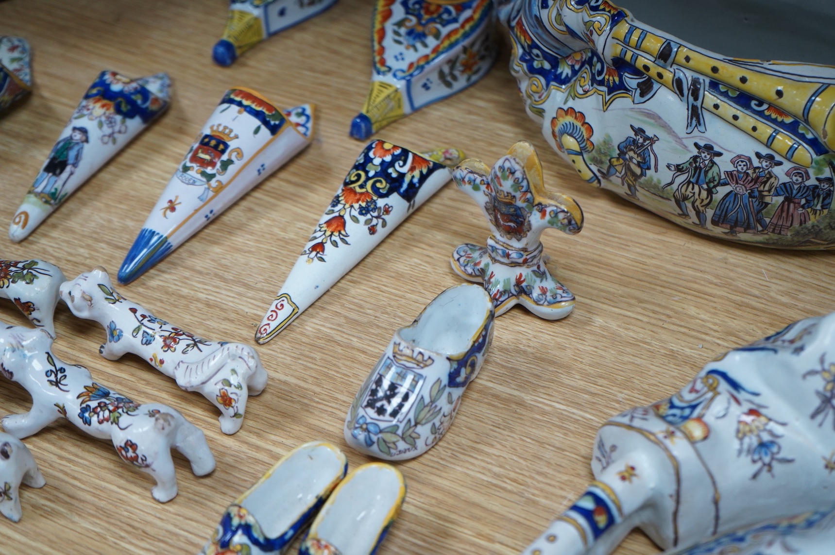19th century French decorative faience including bag pipes, a large wall pocket, jardiniere etc (22).